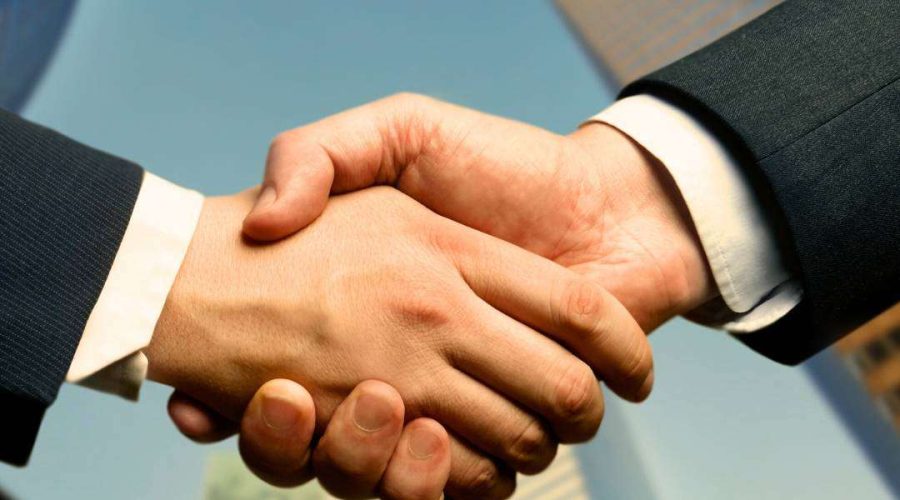job of a private investigator two-private-investigators-uk-shaking-hands